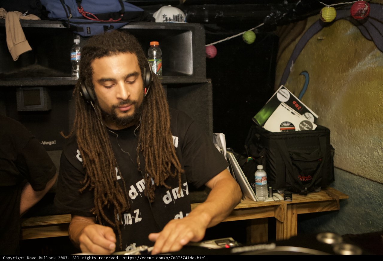 Dreadlocked DJ Grooves to the Beat