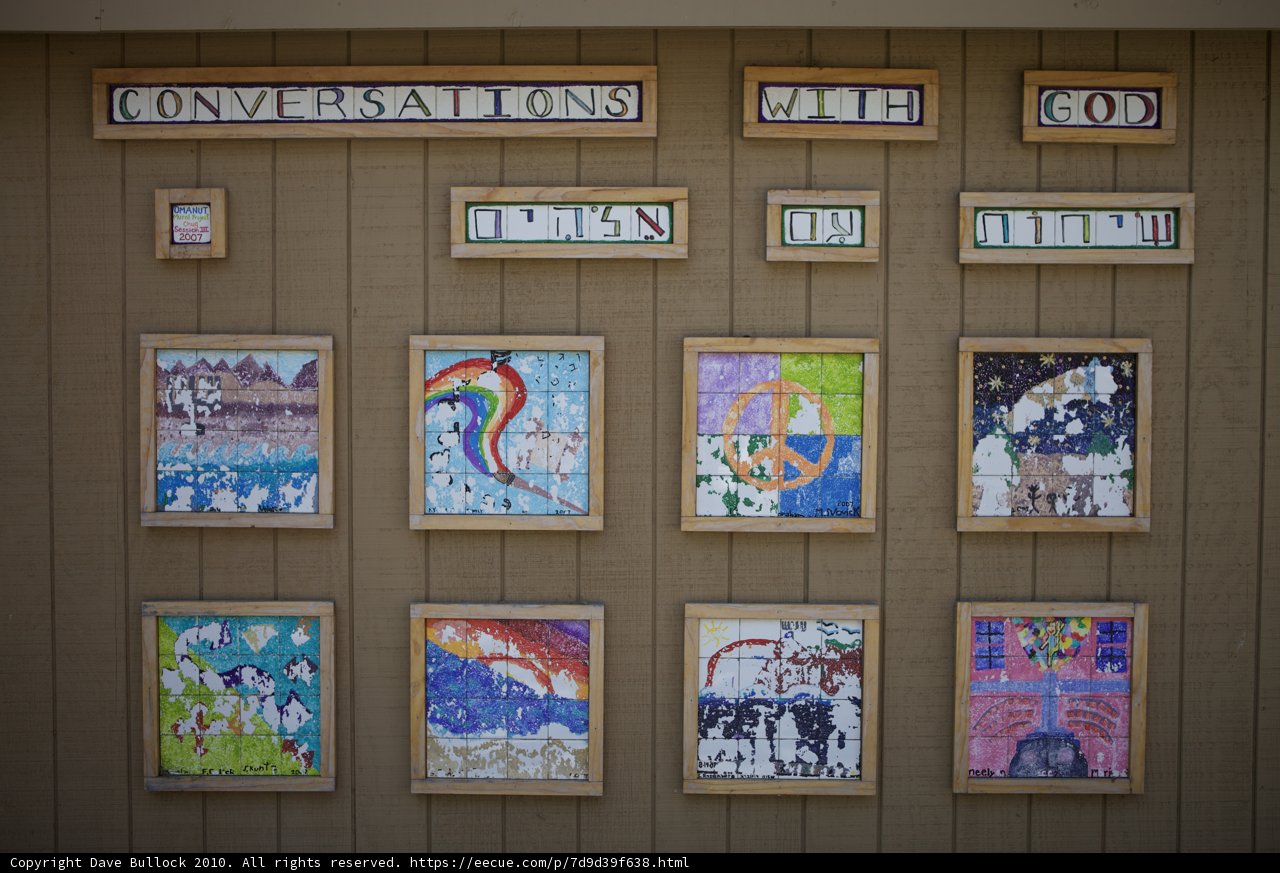 An Artistic Collage of Animals and Words on a Wall