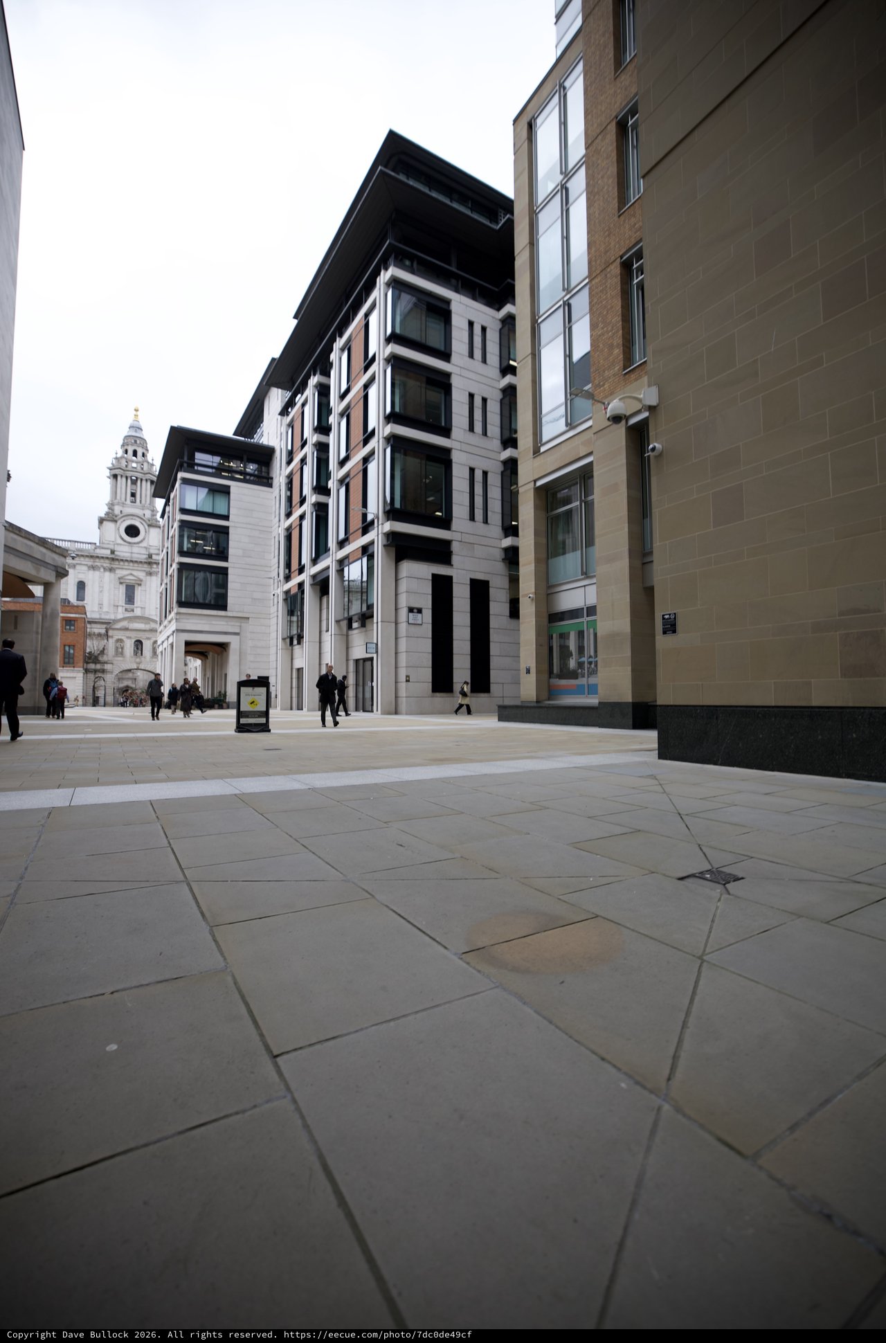 Modern Urban Plaza with Historic Church Tower View