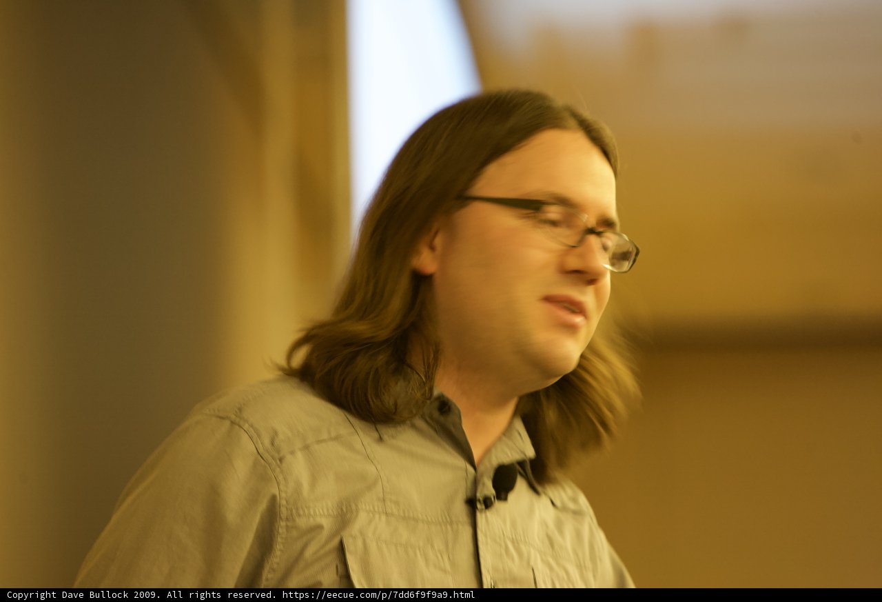 Long Haired Man in Glasses and a Shirt