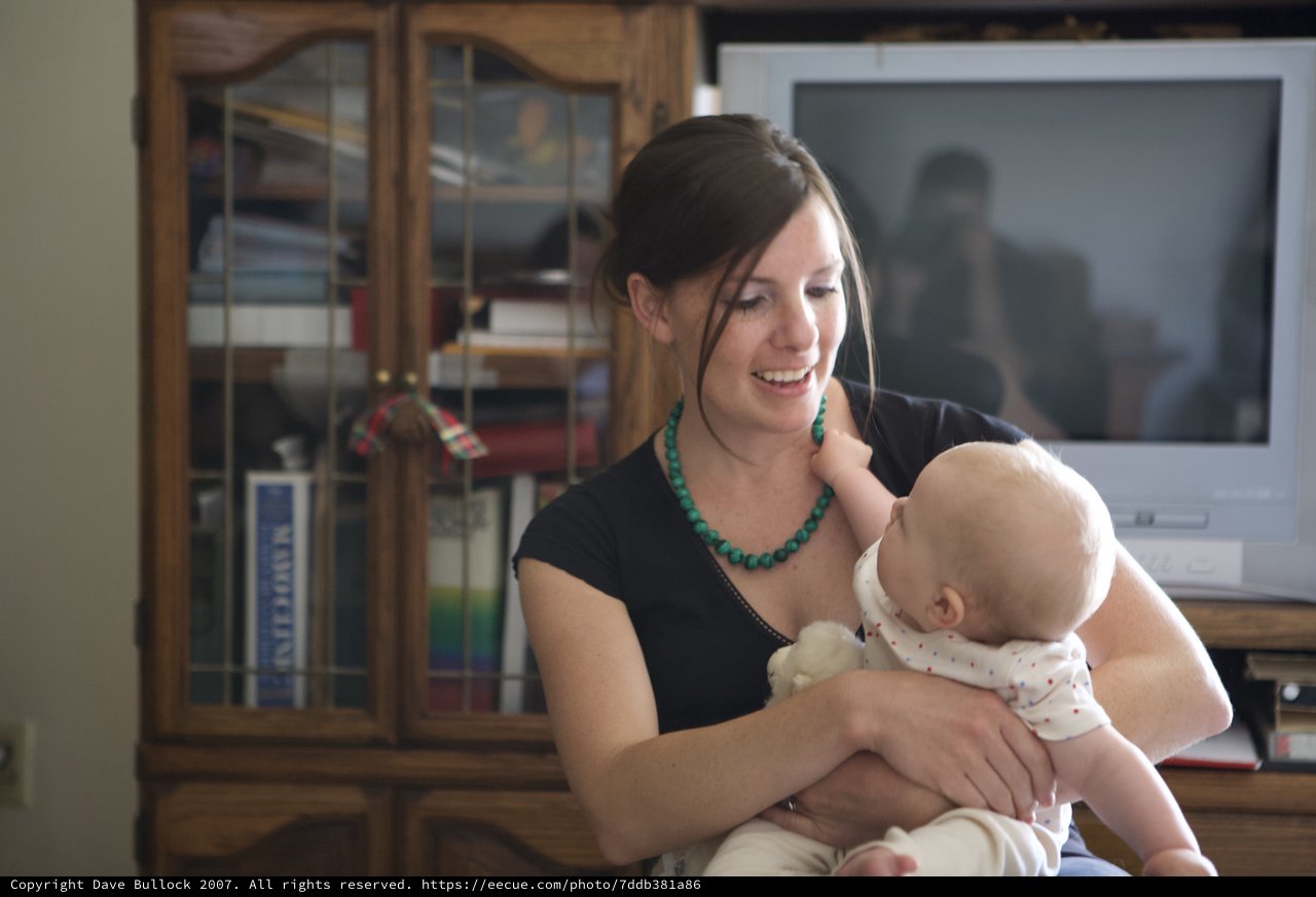 Mother's Joy: Tender Moment With Baby at Home