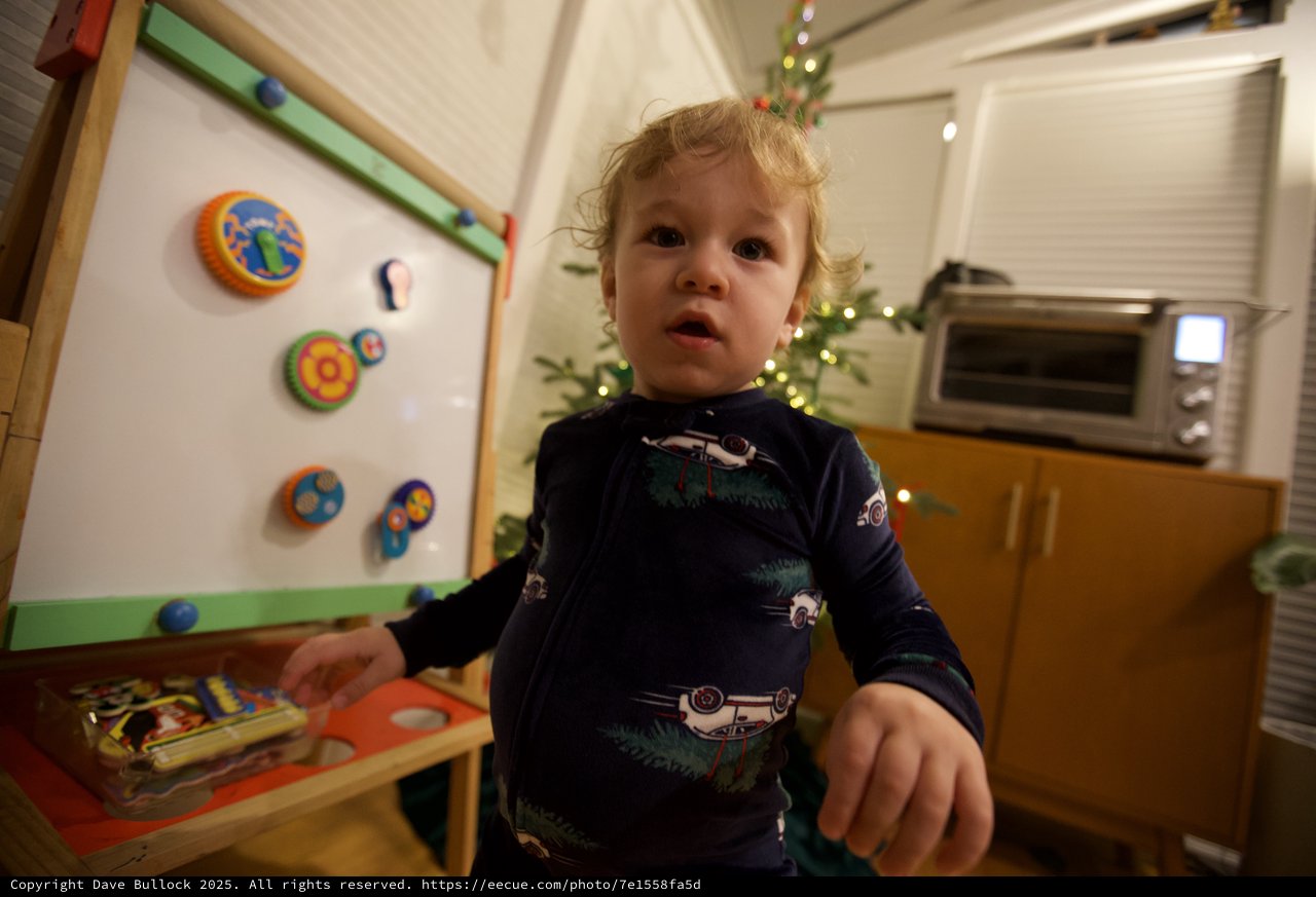 Toddler's Curious Christmas Morning in Kitchen