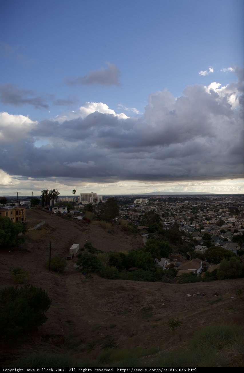 Moody Cumulus Sky over Rolling Hills