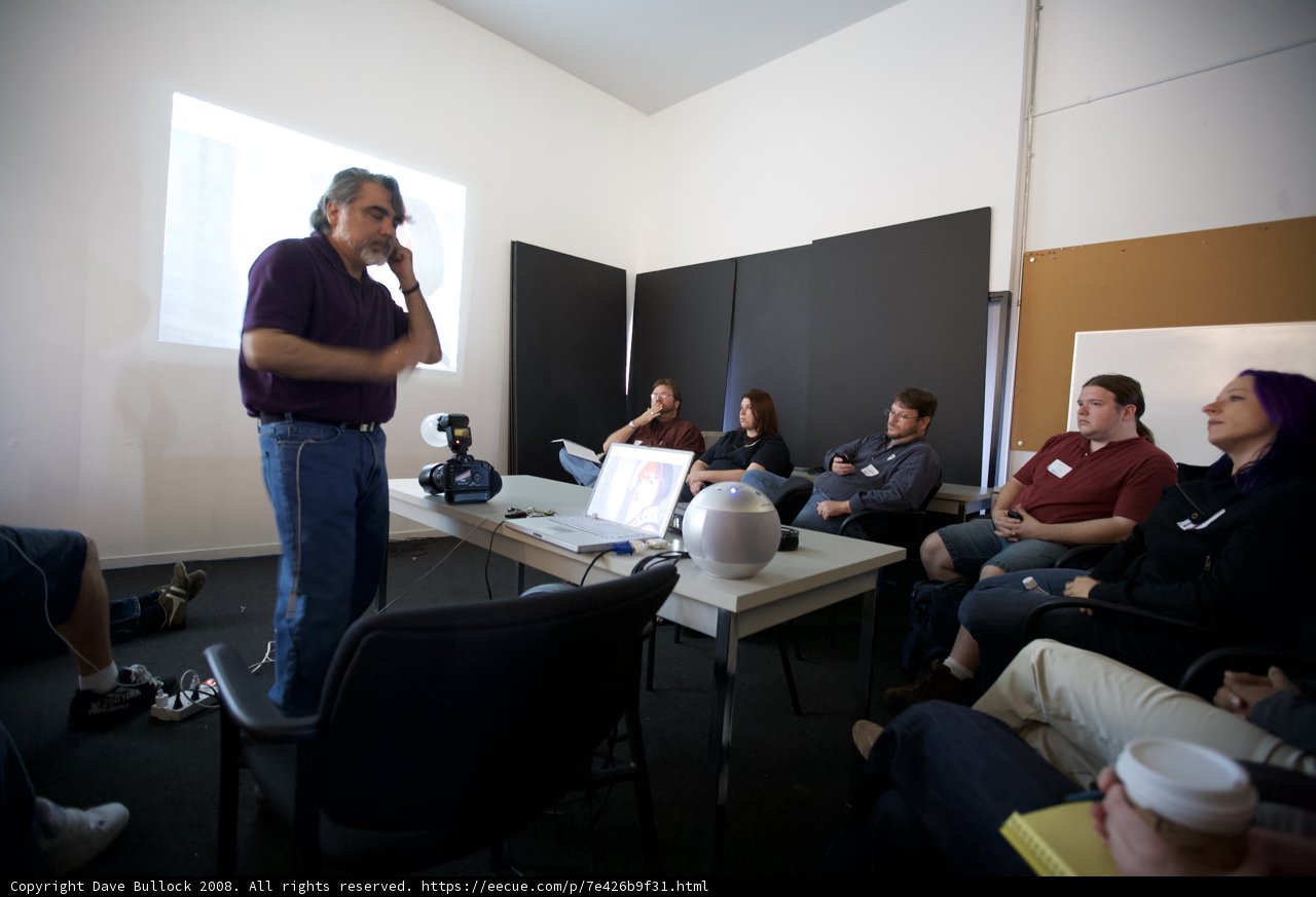 Man giving a presentation on a laptop