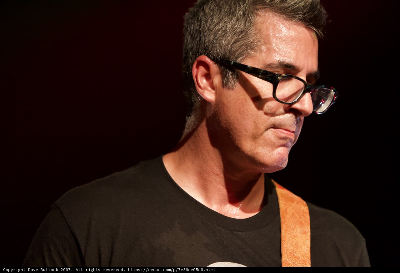 Rocking Out with Glasses and a Guitar