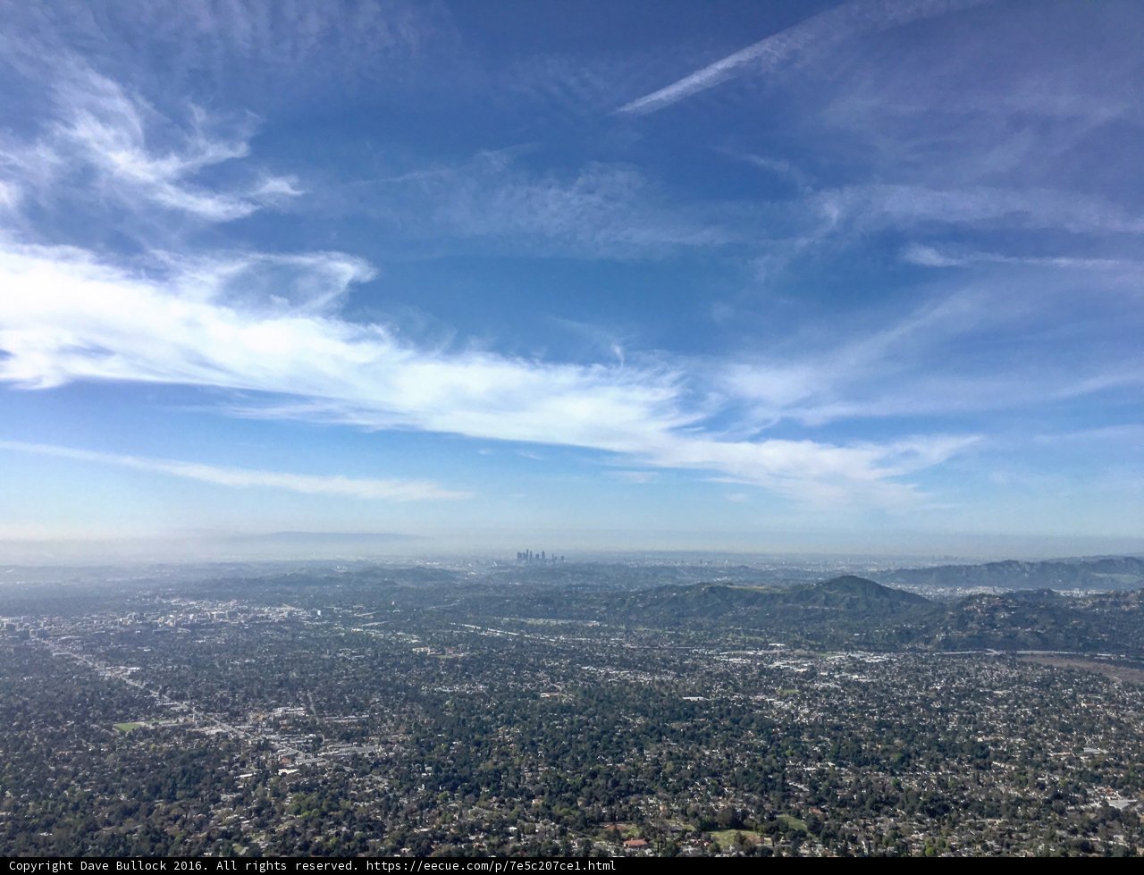 Overlooking a Majestic City and Hills from Above