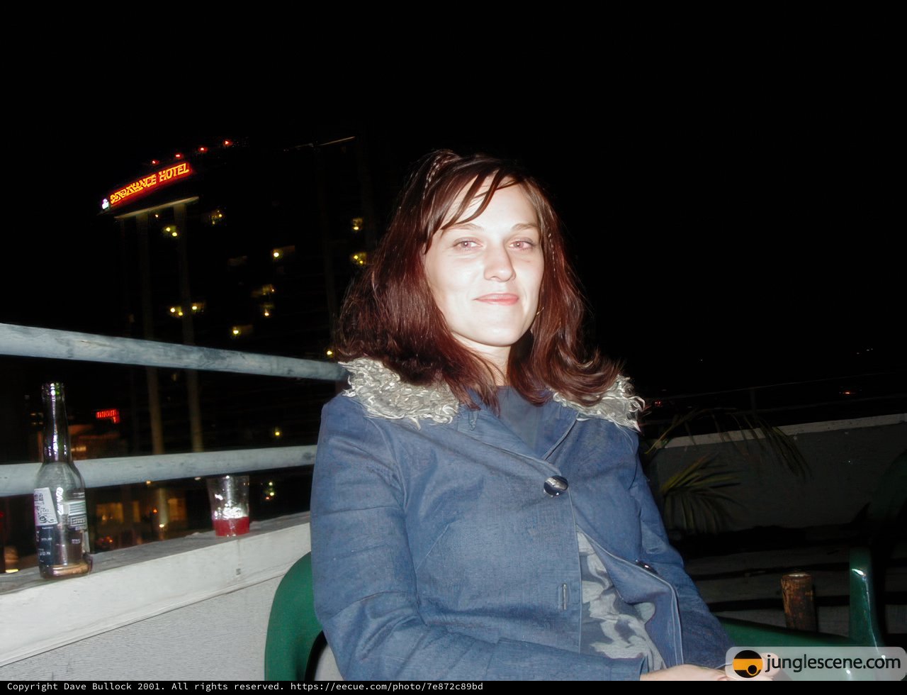 Night Portrait of a Woman on a Balcony