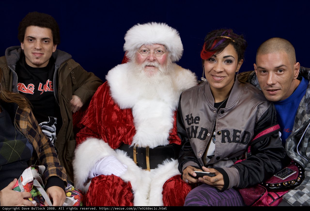 A Group of Festive Friends with Santa Claus
