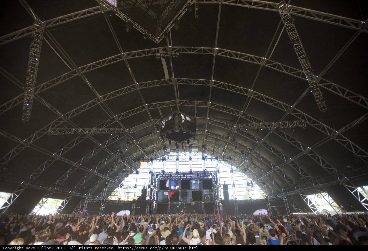Crowd Goes Wild Under Stage Lighting