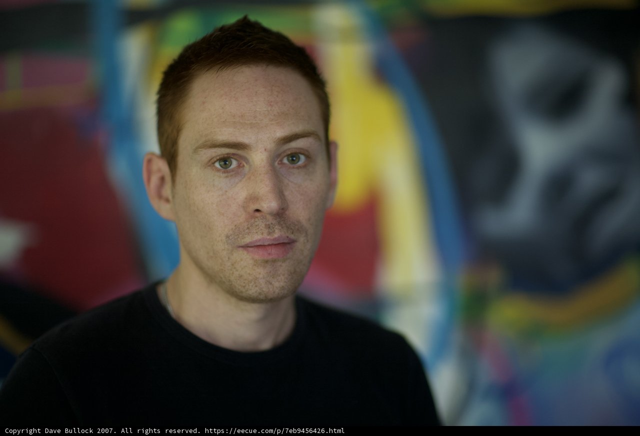 Vibrant portrait against a colorful wall