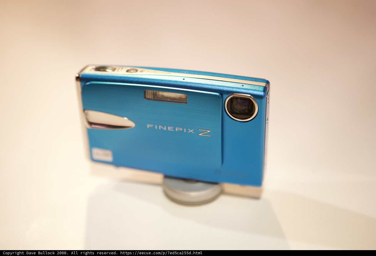 Blue Digital Camera on Table