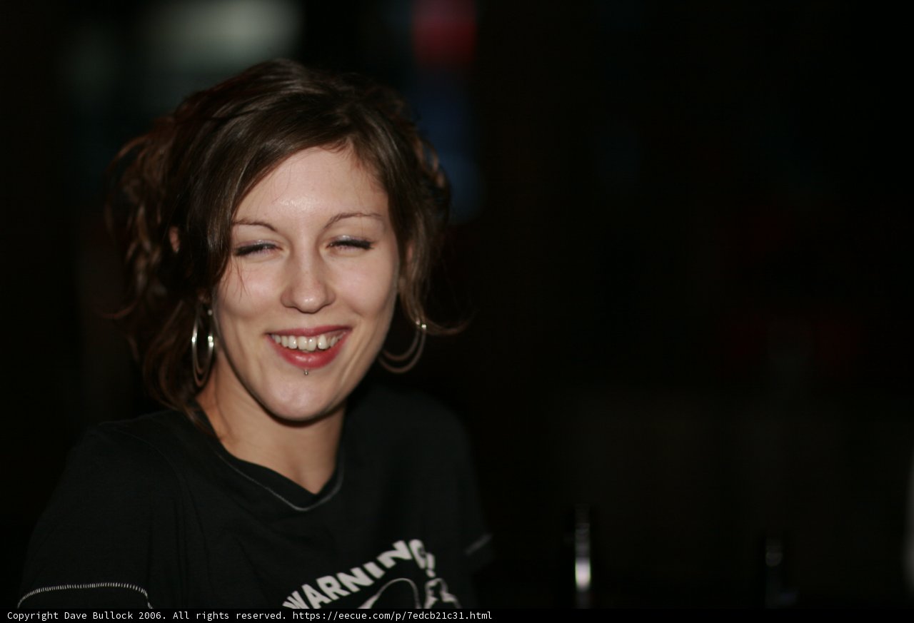 Smiling Woman with Cell Phone