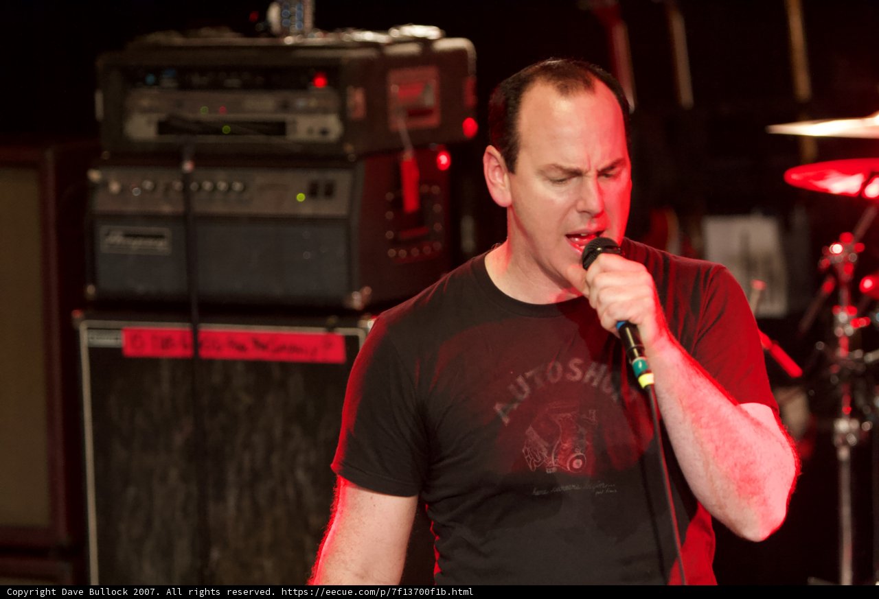 Black-Shirted Entertainer Rocks the Mic