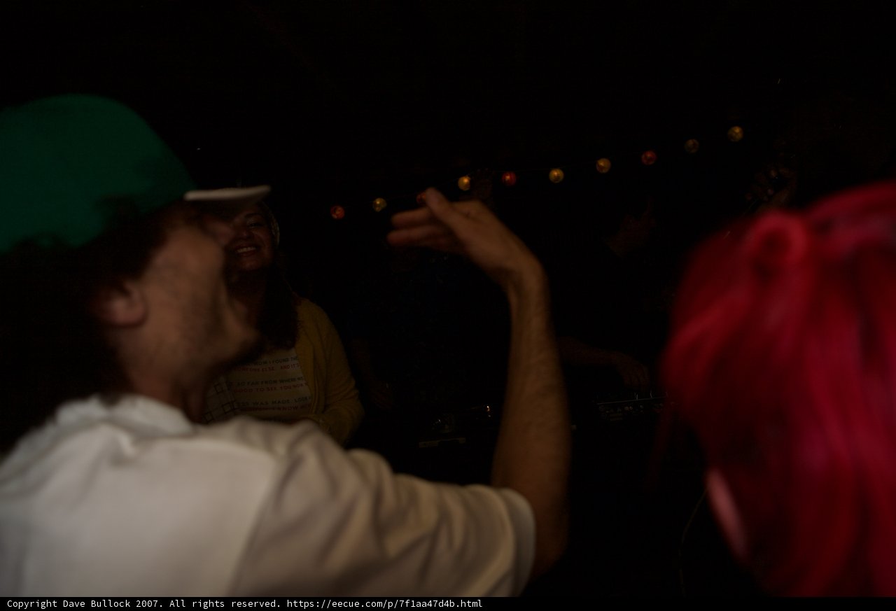 Red-Headed Man Grooving at Urban Night Club