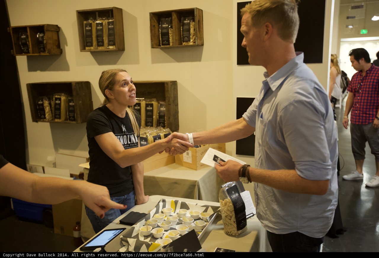 Business Deal on Plywood Table