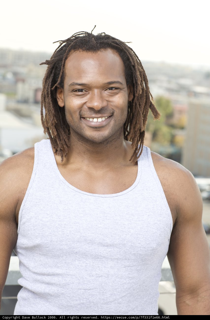 Smiling Man with Dreadlocks