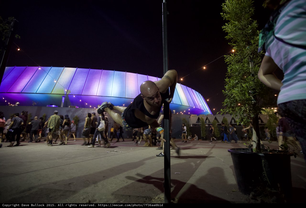 FYF Fest Bald Man Horizontal Pole Reach LA Sports Arena Rainbow Lights Crowd Night