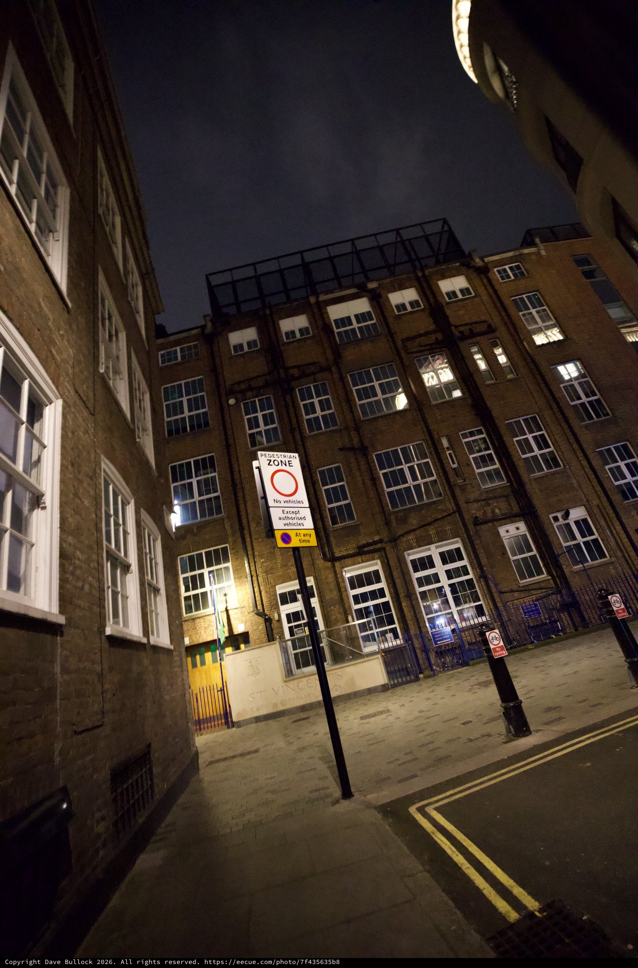 Pedestrian Zone in London Industrial District at Night