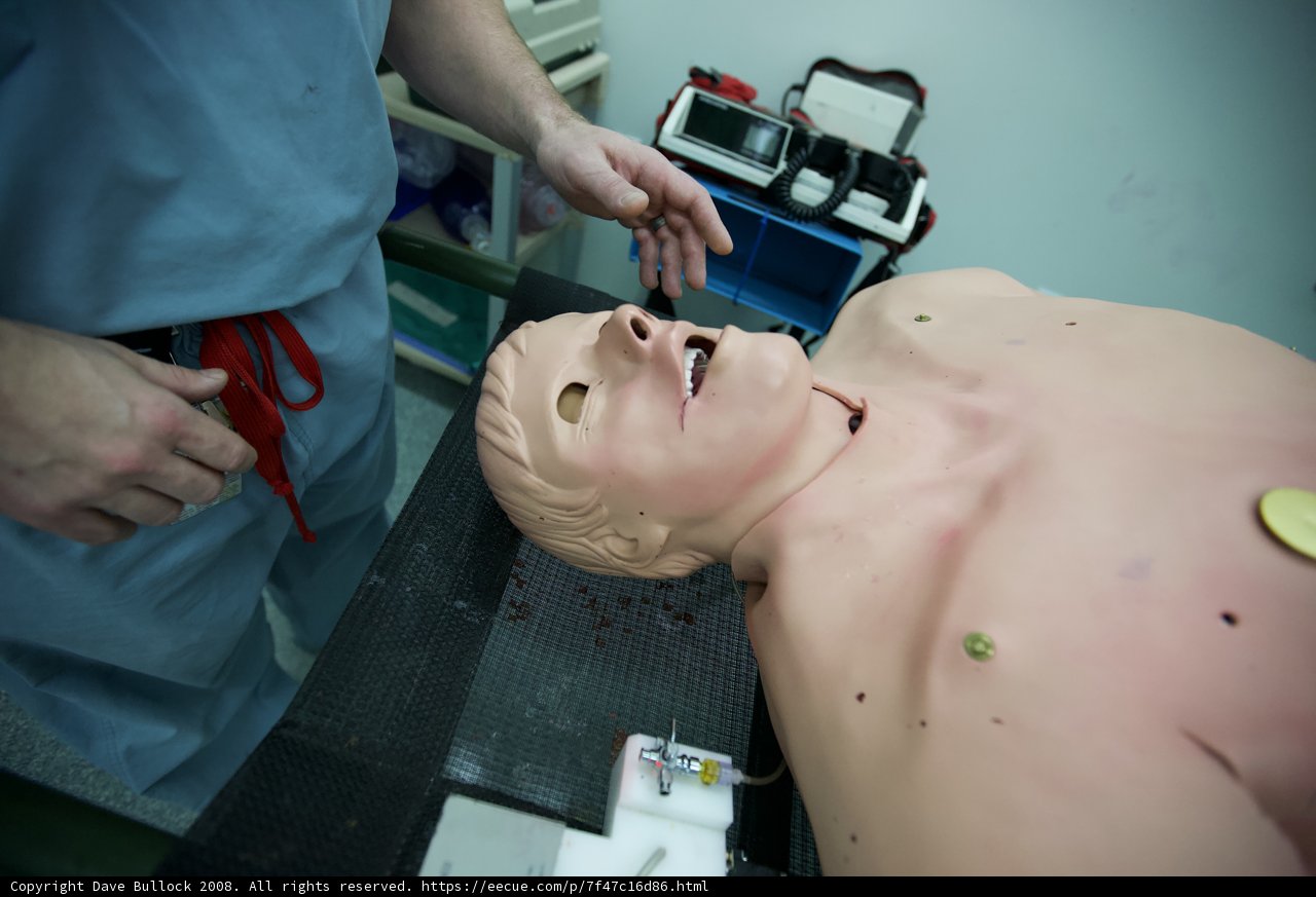 Man Preparing Medical Training Dummy