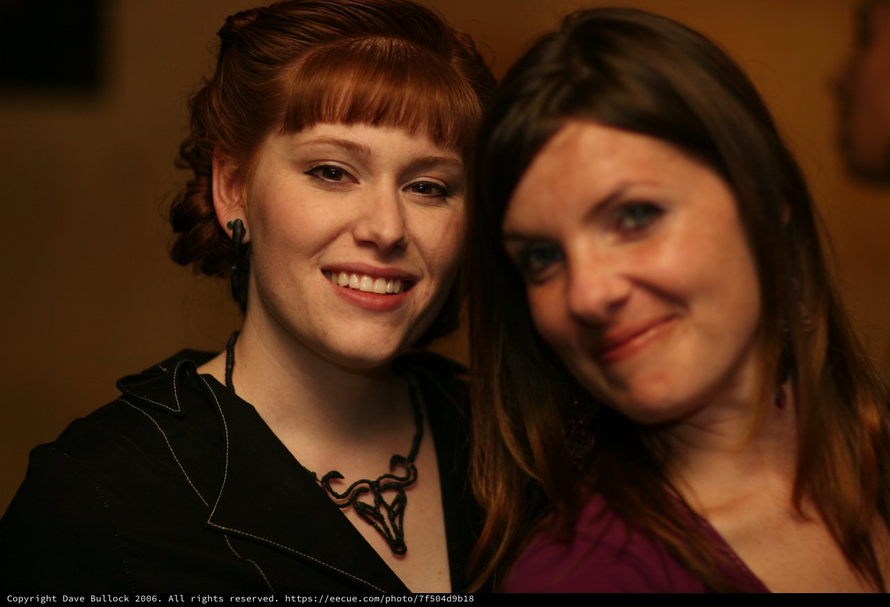 Two Smiling Women Share a Warm Moment Together