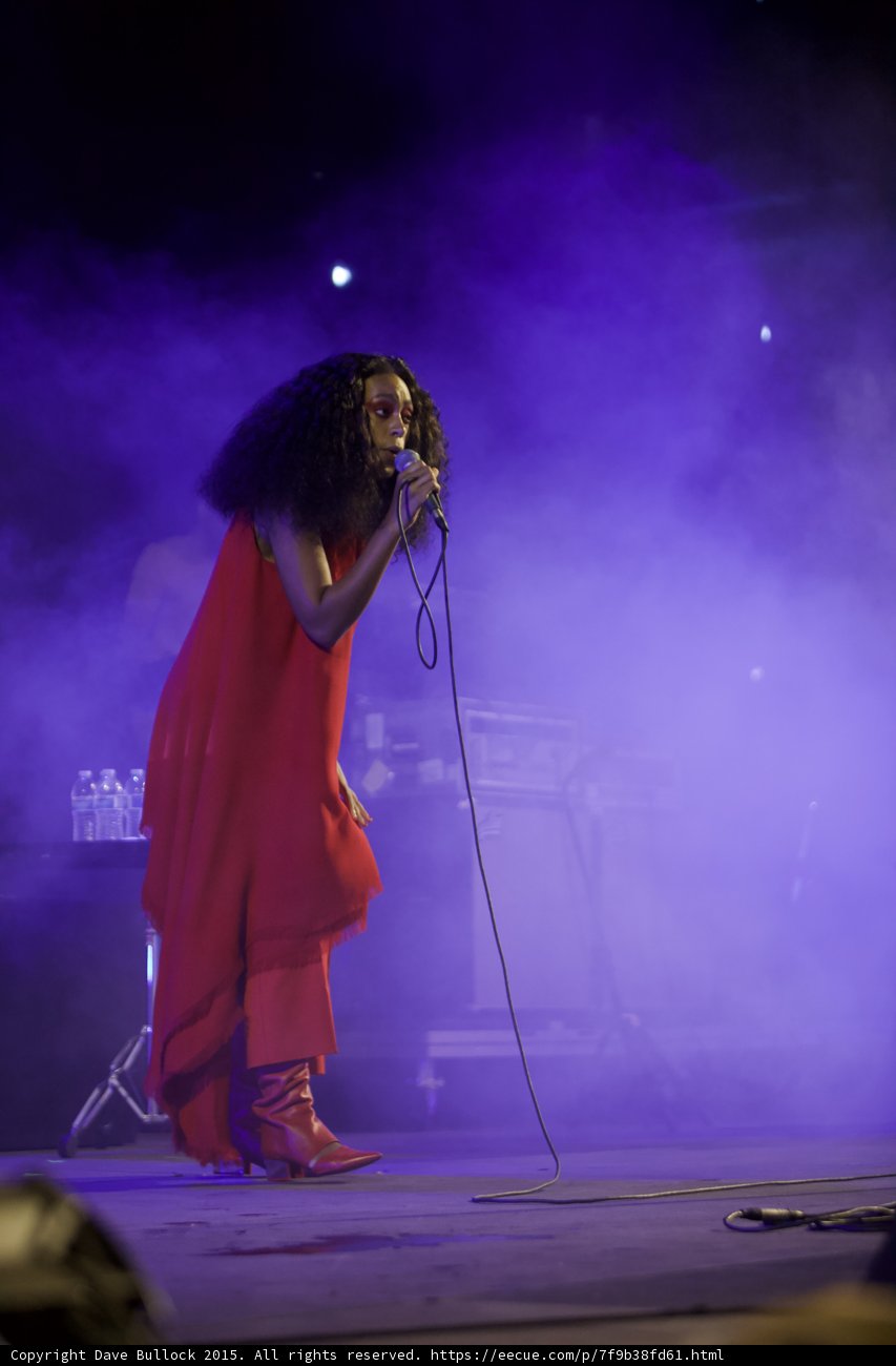 Solange Full Body Red Dress Fringe Keyboard Background Purple