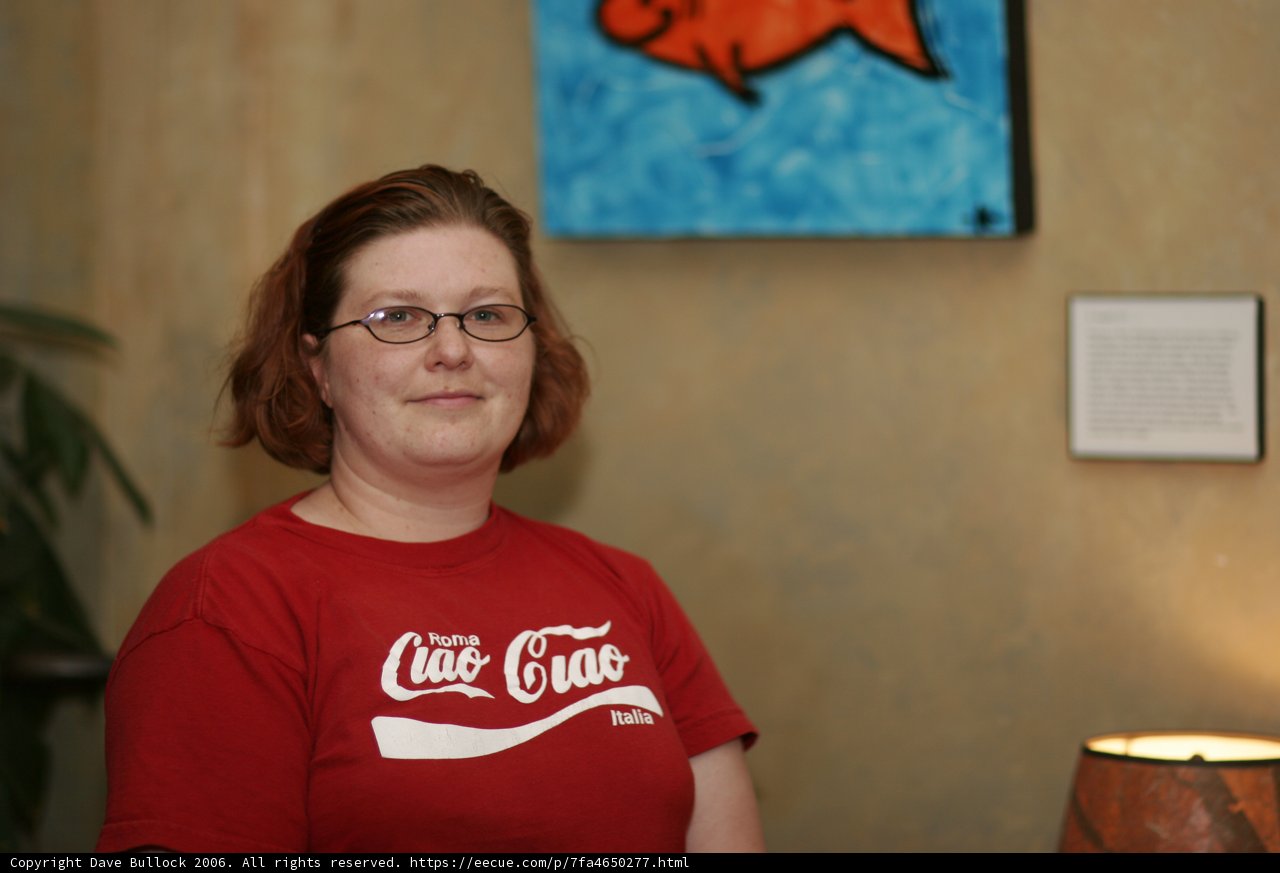 Red Shirted Woman Admiring Downtown Art