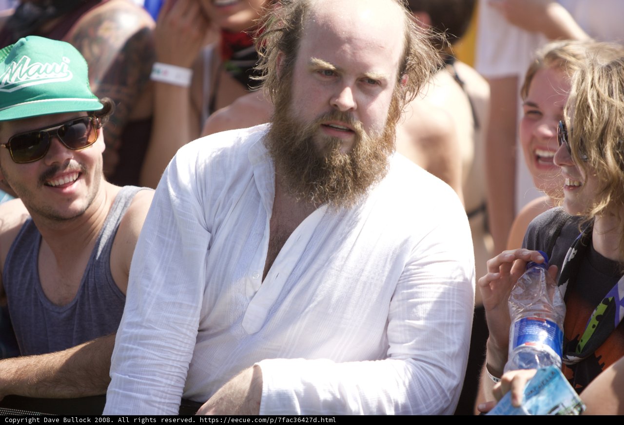 Sitting with Sunglasses and a Beard at Coachella