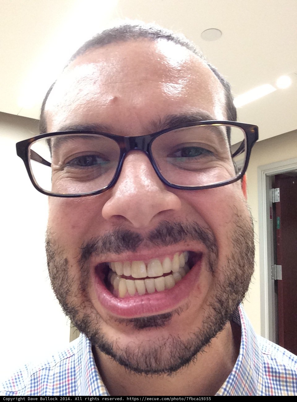 Portrait of Happy Man with Glasses