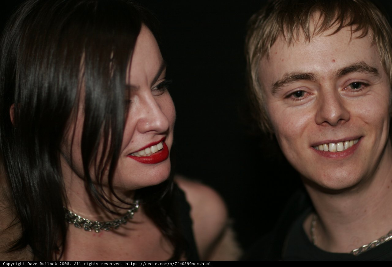 Smiling duo adorned in jewels