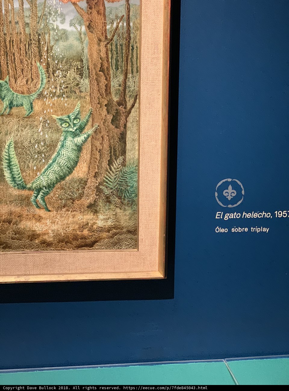 Blue and Green Creature in Wood Frame