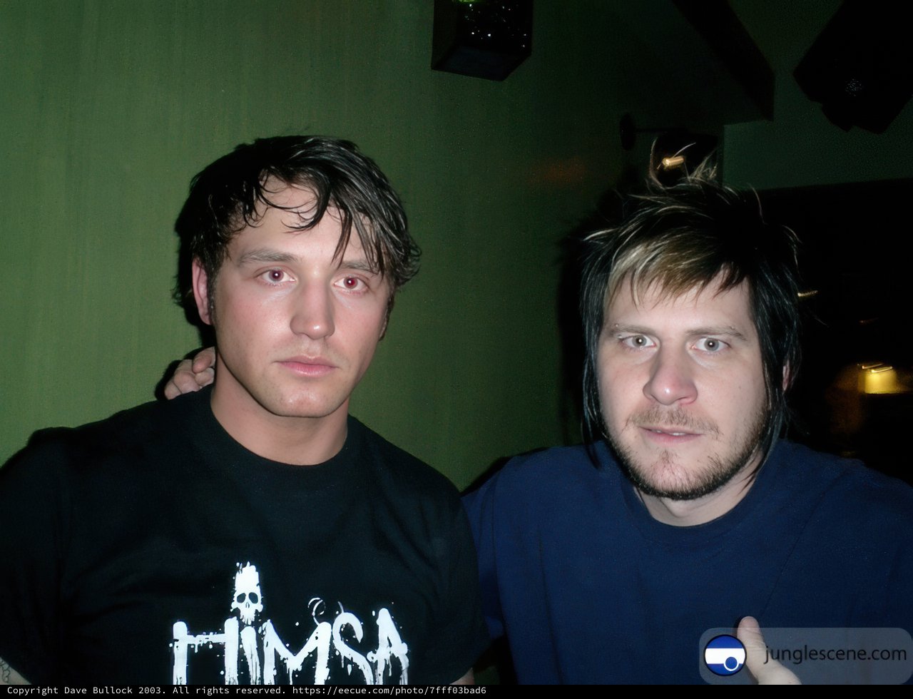 Two Men Posing for a Portrait in an Urban Setting
