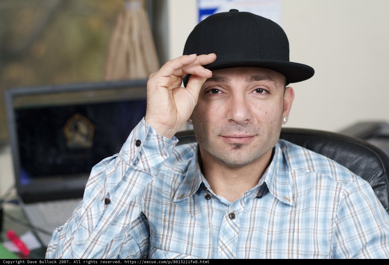 Hat-wearing Man in Plaid