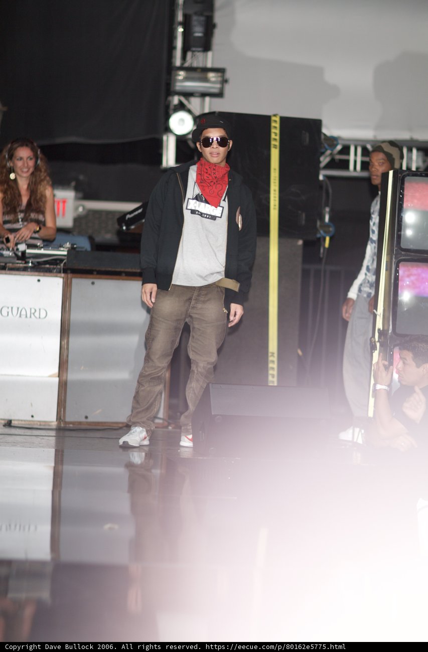 Fashionable Man with Red Bandana and Glasses