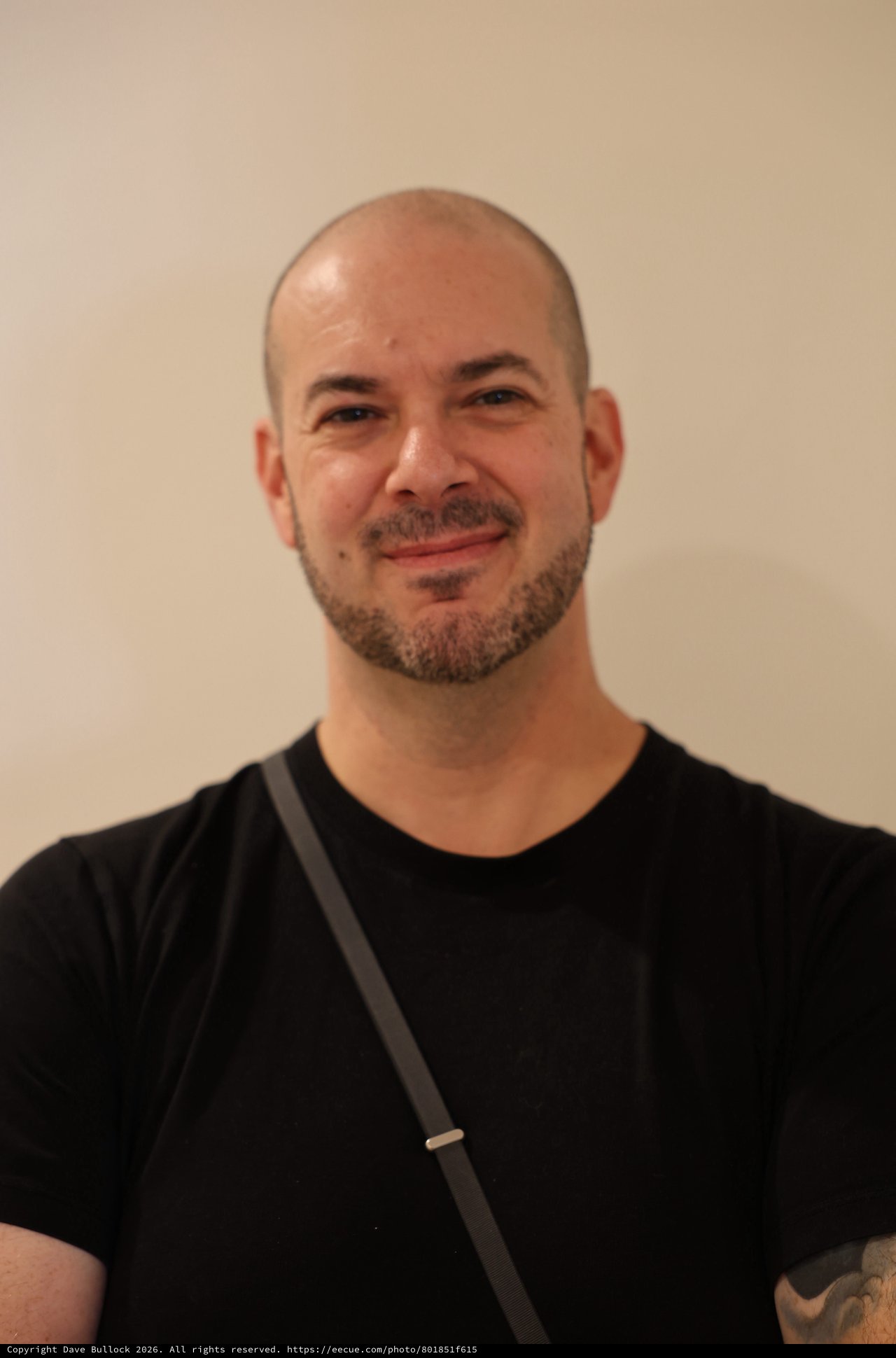 Professional Portrait of Bald Man in Black Shirt