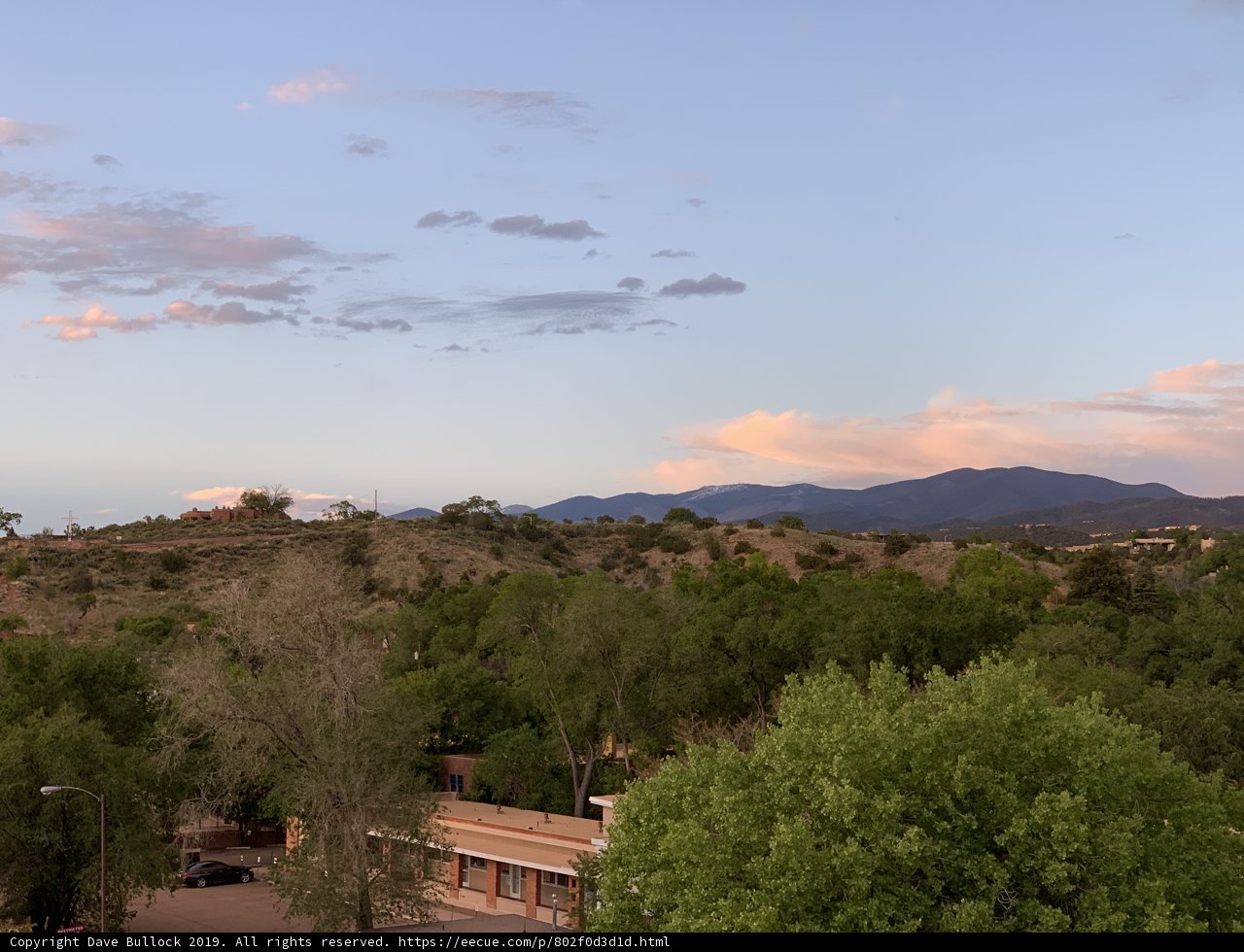 Rooftop View of Mountains and Trees