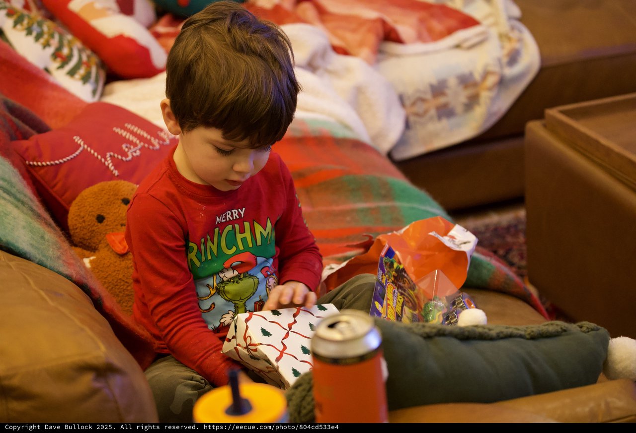 Christmas Morning Joy: Child Opening Presents