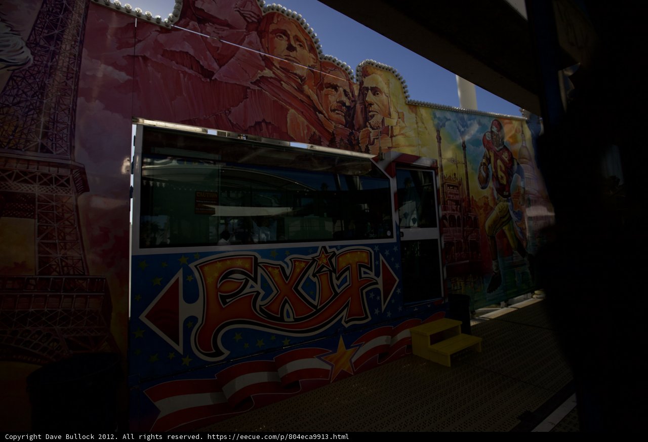 Colorful Food Truck Parked Next to Mural