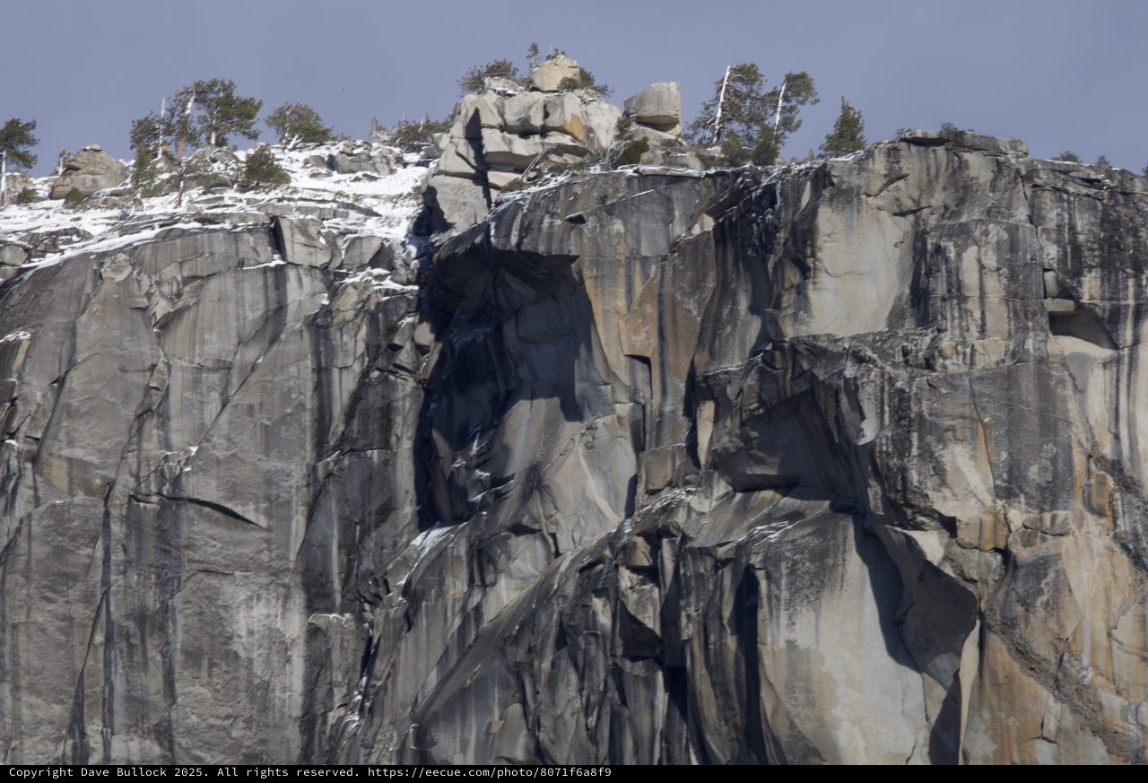 Dramatic Granite Cliff Face with Winter Snow