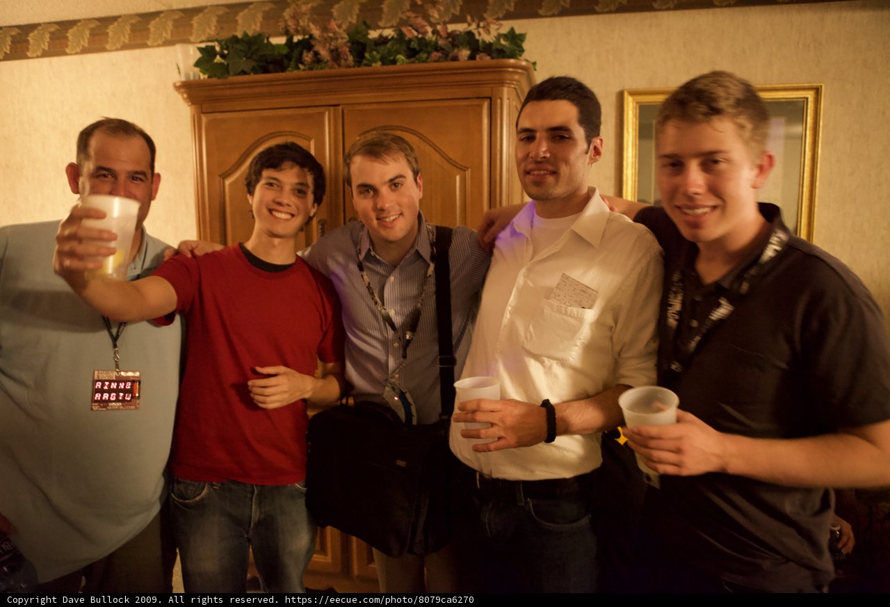 Group of Men Enjoying Drinks at the Pub