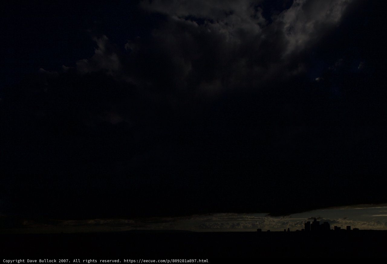 Cityscape under a Mysterious Night Sky