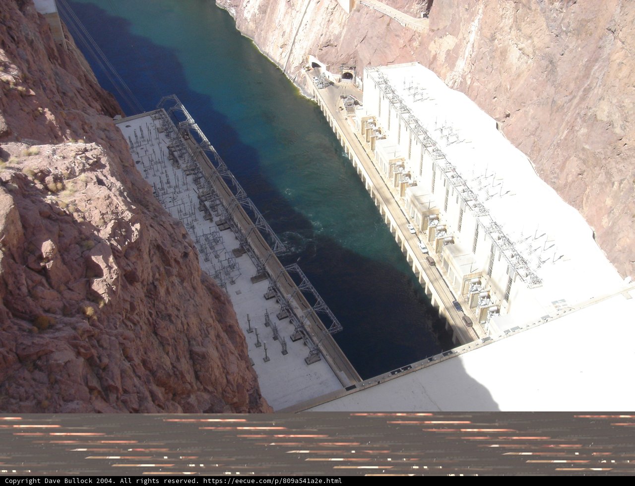 A Panoramic Vista of Hoover Dam from the Canyon Top