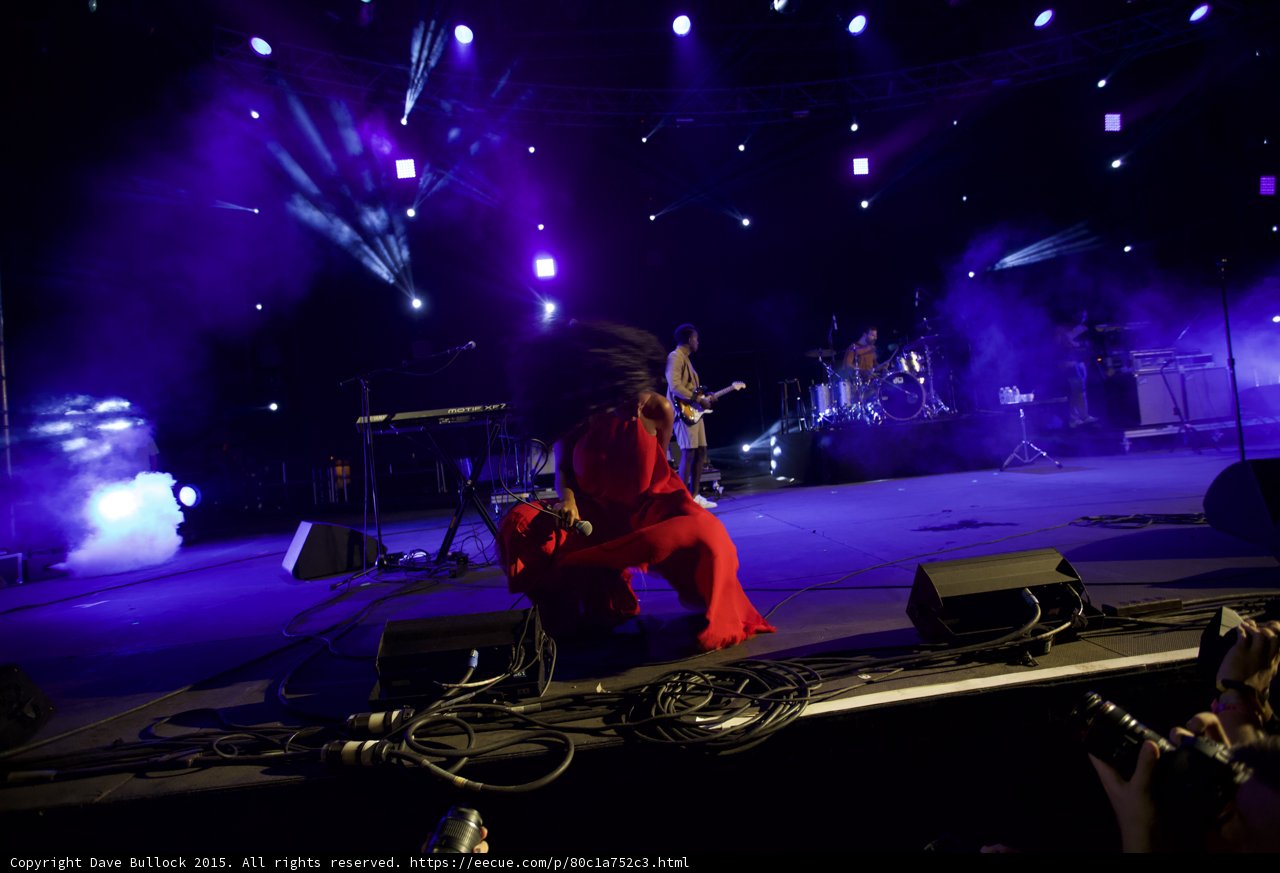 Solange Hair Whipping Crouching Red Dress Dynamic