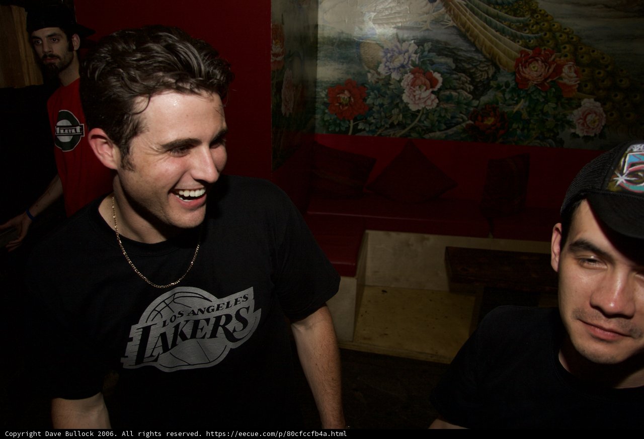 Black Shirted Men Laughing Together