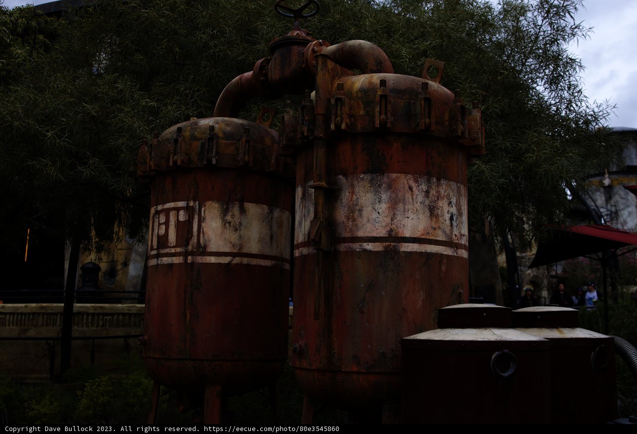 Rusting Pipes in front of Abandoned Factory