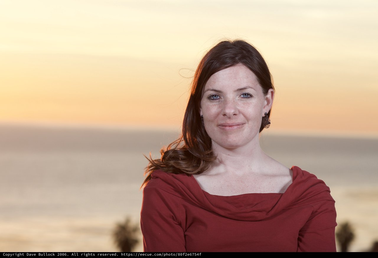 Woman in Red at Golden Hour Beach Sunset