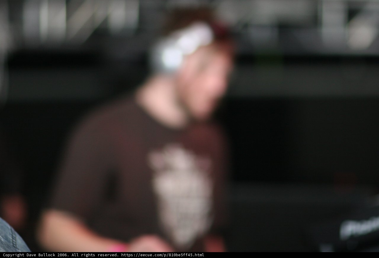 Blurry Man in a Dark Room