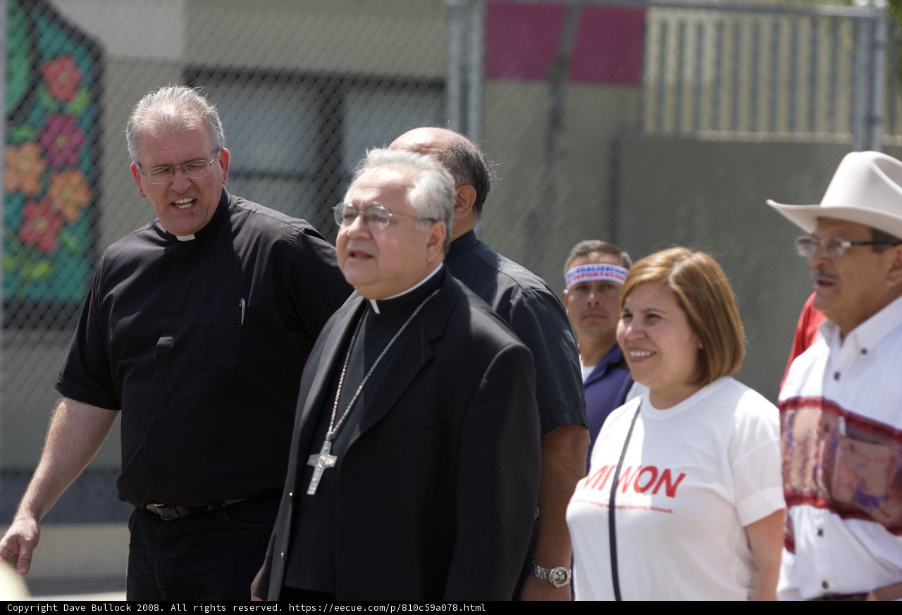 The Priest and His Flock at the Mayday Rally