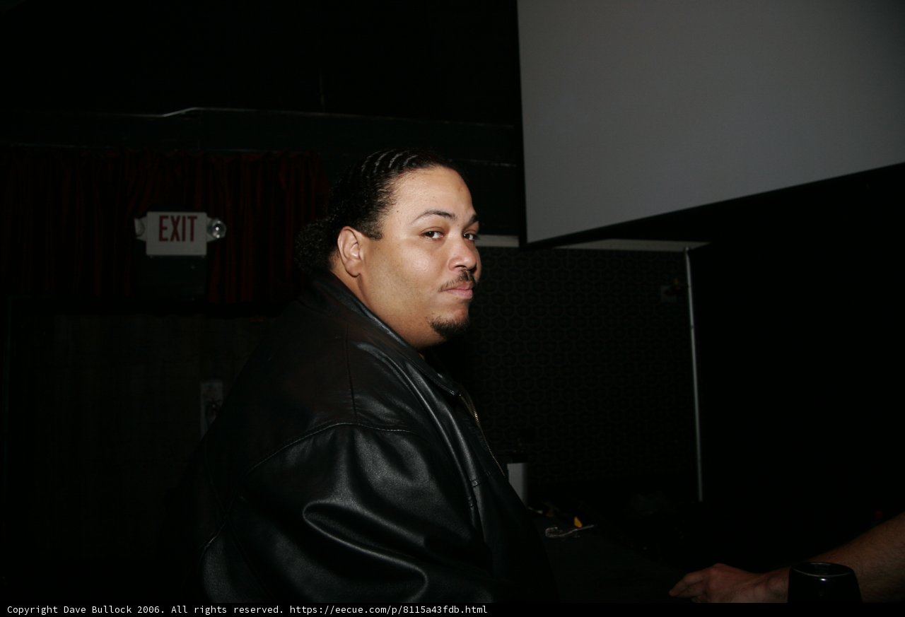 Black Jacketed Man Commands the Screen