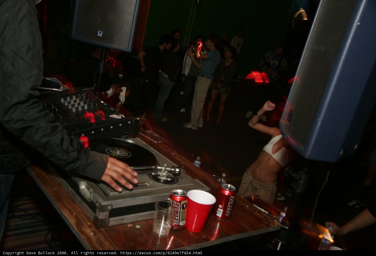 DJ Drops Beats at Nightclub