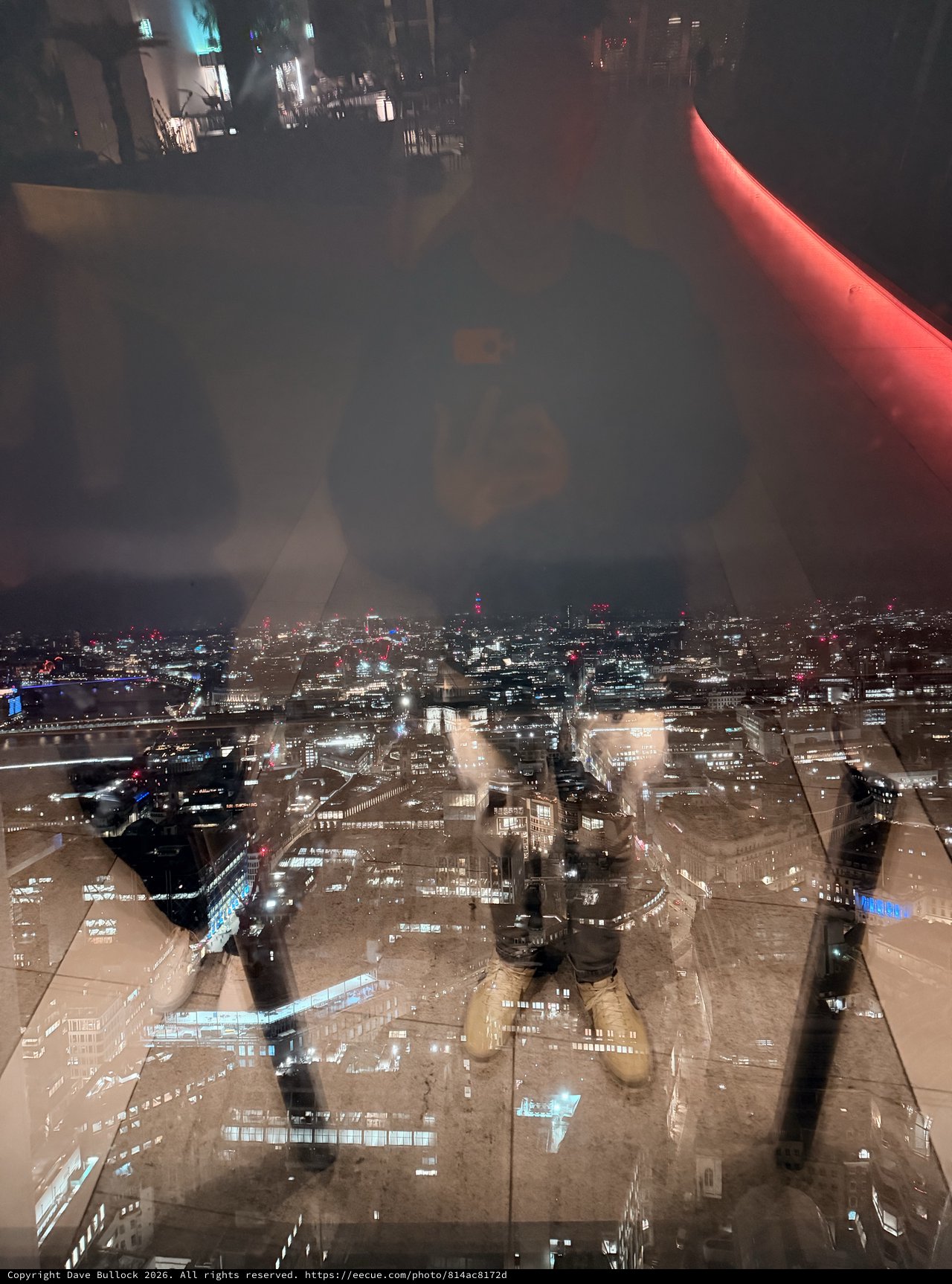 Double Exposure: London Skyline Through Indoor Reflection